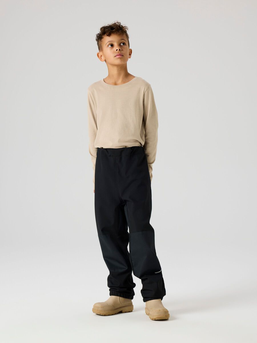 Product carousel image - WATERPROOF SOFTSHELL TROUSERS, Black | 2
