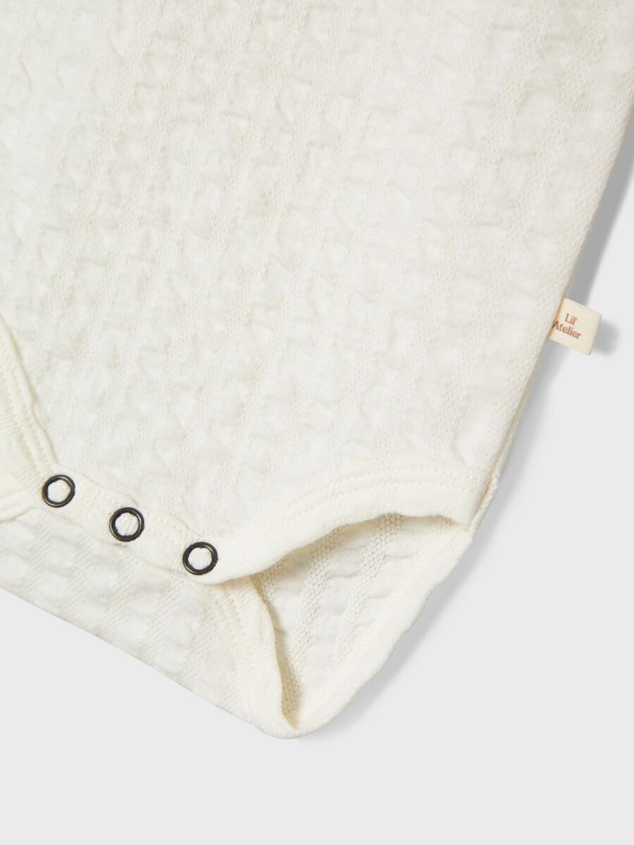 Carousel image 3 KORTE MOUWEN ROMPER, Coconut Milk