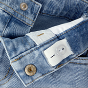 Bouton-pression et braguette factice